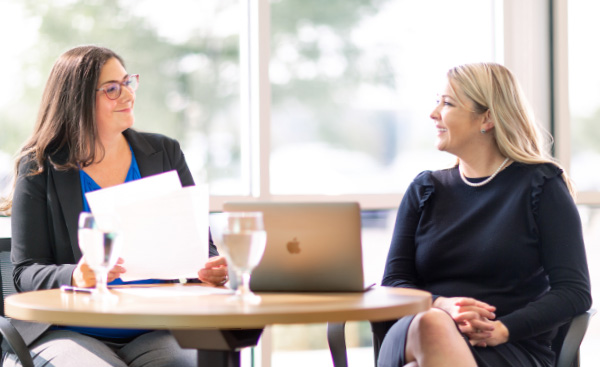 Two professionals having a positive conversation